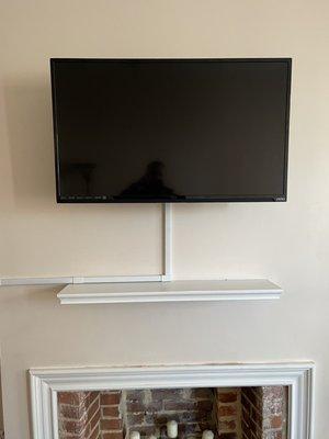 39 inch TV with cable covers and shelf installation