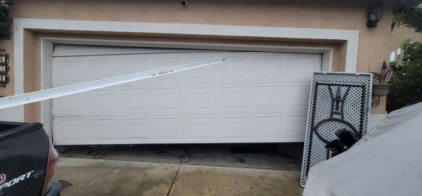 Broker garage door because I accidentally closed the folding table on it...