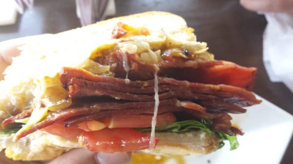 Meaty, salty, and dripping with hot white creamy stuff. This Hangover sandwich will fill you completely. (no comment)