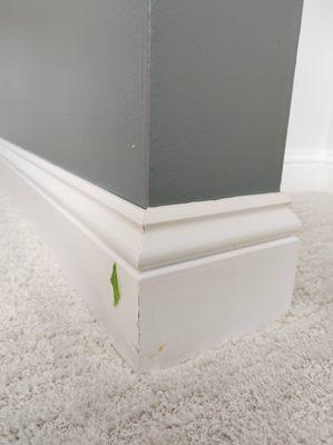 Damage to baseboard and paint