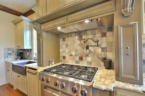 Lake Lanier home. Main kitchen includes professional grade appliances and a copper hammered farm sink.