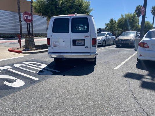 Frito Lay van taking 2 parking spaces at the front entrance to Target Murrieta North near Clinton Kieth Road.