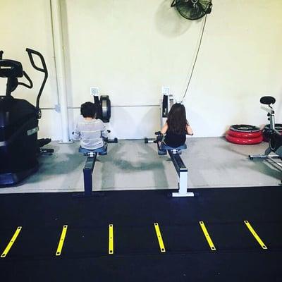 My kids exercising on Concept 2 row machine!