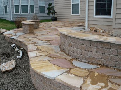 Irregular shaped natural stone known as 'Allegheny Rose' to provide that south by south west connection.