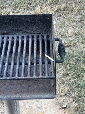 Nasty cigarette left on the community grills that ALL residents are supposed to be able to use!