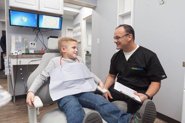 Dr Bartos and a young patient