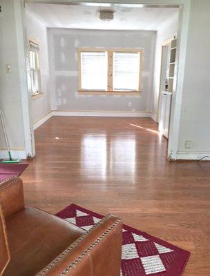 Looking into the Dining Room- new sheet rocked walls, and new Bruce© Hardwood flooring in place. Not seen are new doors and window trim.