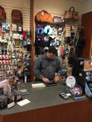 Phillip working diligently at the register