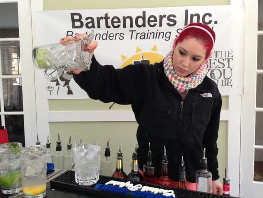 Bristi straining a nice cocktail at Bartenders Inc. Workshop!