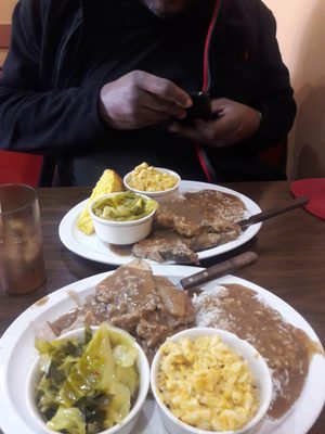 Smoothered pork, mac n' cheese, and cabbage done right!