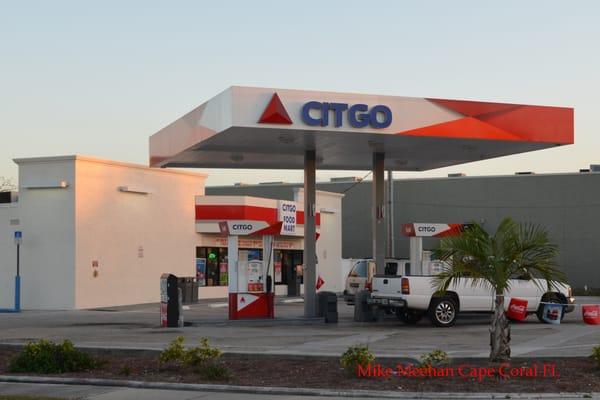 Pump island with store in background.