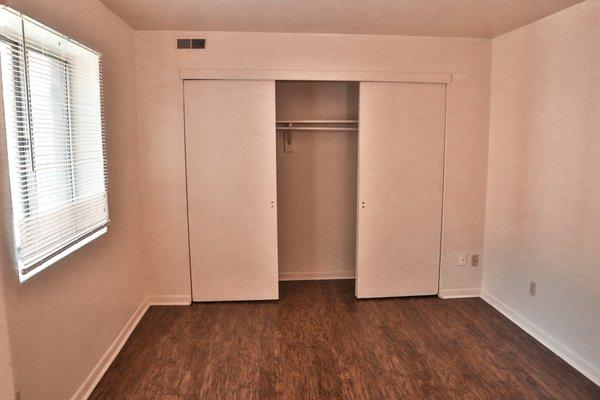 Southgate Apartments unfurnished bedroom (new faux wood floors in every unit).