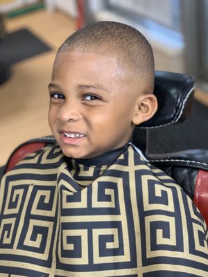 Kids mid bald fade w/ sharp line up