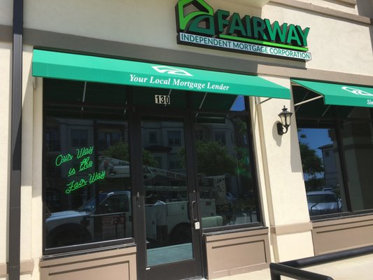 You'll recognize us by our green awning.