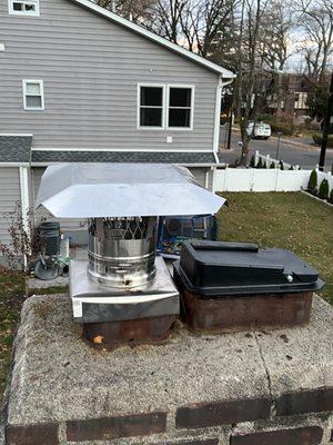 A new cap was built around the chimney. The original cap was taken off to be replaced with a new one.