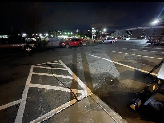 Ramp on other size. Handicap ramp. No handicap spaces around