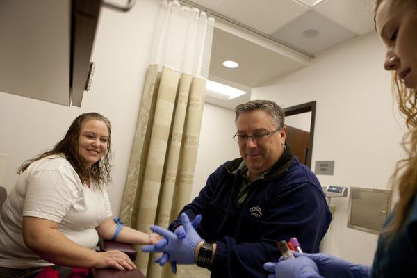 Thom Owens, RN, enjoys his work with patients