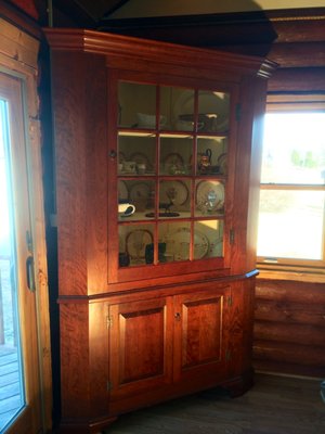 1850s reproduction cherry corner cabinet