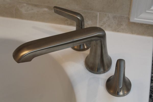 Bathroom remodeling detail shot - Faucet Installation