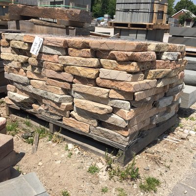 An alternative to concrete products, natural wall stone can be used for stacked garden walls and fire pits!