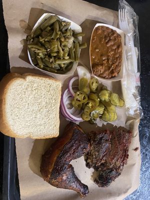 Brisket, chicken, crazy beans (ranch style with brocket and sausage), green beans.