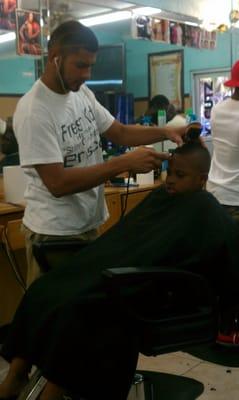 my nephew getting a mohawk from Spade