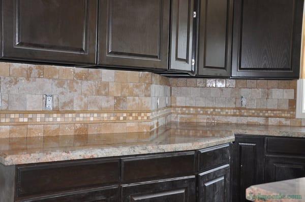 kitchen backsplash and cabinets.