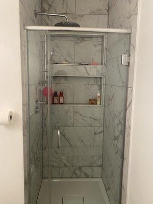 I LOVE the shelves they built into the walls of my shower!