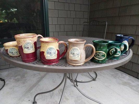 A variety of Deneen mugs.