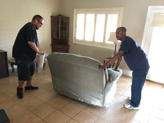 all of your overstuffed furniture gets shrink wrapped for added protection against dust and dirt.