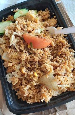 Thai fried rice with crab meat, soy sauce added