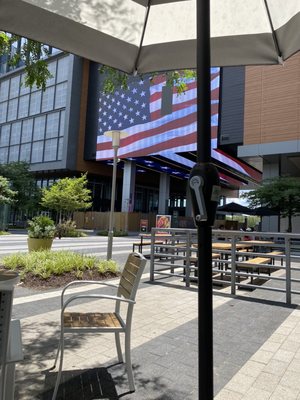 Out front of the building. Founding farmers, matchbox, cvs, Starbucks, sweatleaf, & big buns right there.