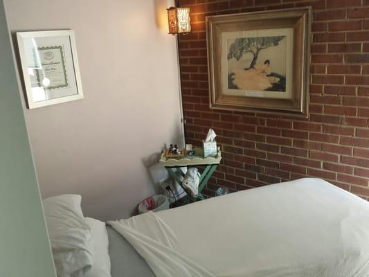 Massage room - 10min of massage is included with acupuncture session. Additiinal time or massage only appt. are available.