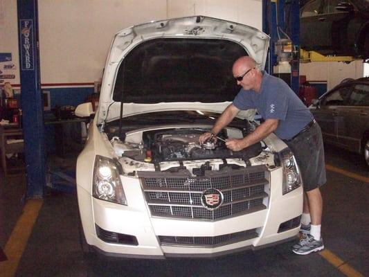 Not just exhaust. Randy installs a waterpump on a Caddy CTS.