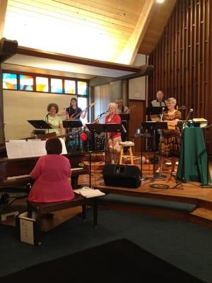 Kairos Band rehearsing before worship.