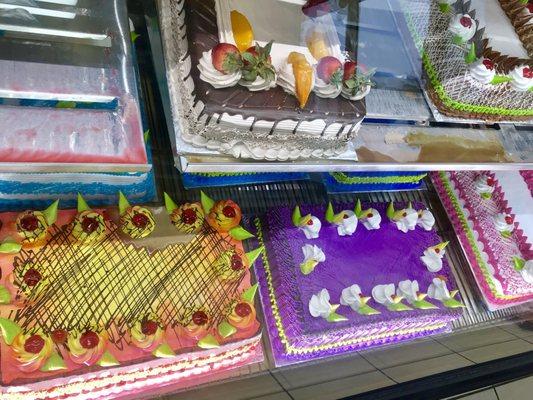 Beautiful and vibrantly decorated pasteles! Usually someone is picking up one whenever I visit.