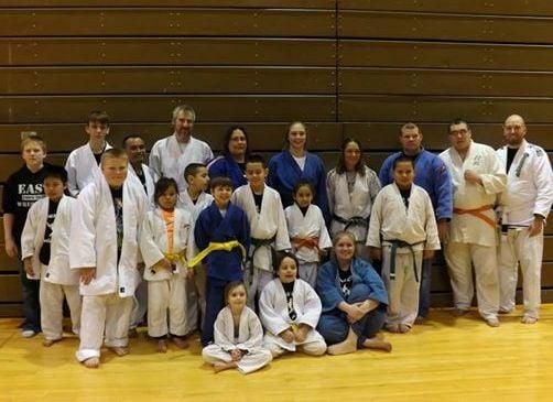 Dr. AnnMaria De Mars with members of the Sioux City Judo Club at the "Fight Like a World Champion" Judo Clinic.