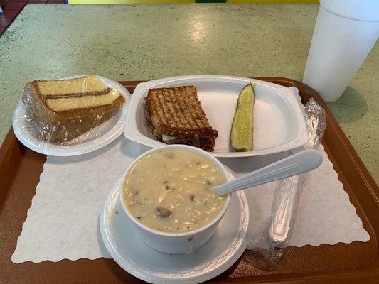 1/2 sandwich, cup of soup, caramel cake and water = $8.35. Great deal!