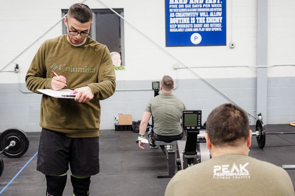 Dan Cadena judging a CrossFit Open workout