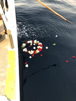 Burial wreath dropped and floating