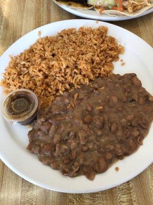 5 tacos - carne asana. Al pastor, chorizo. Pollo asado, pescado,. Side of rice and beans.