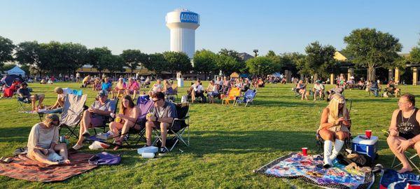 The socially distanced crowd enjoying Silent Rumor Band in Addison Circle Park.  This is the 70s Night Out concert with rock & disco.