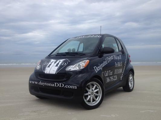 Our Smart car on the most famous beach in the world.