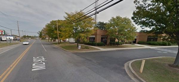 View from Old Washington Rd, with the Greg's Building on the right side, 7/11 & iHop on the left. | Courtesy of Google Maps.