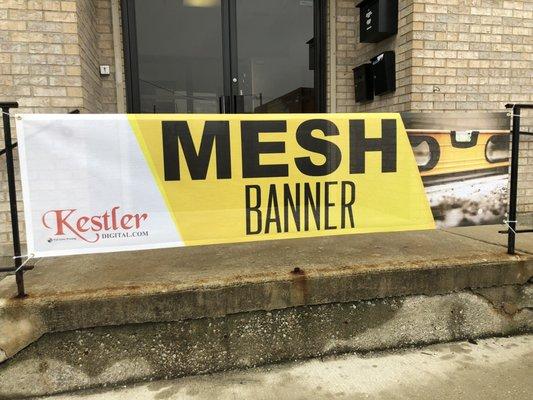 Mesh banner ideal for fence or any outdoor advertising