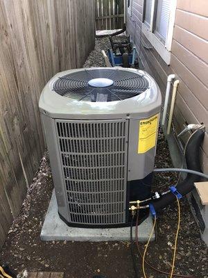 Outside condenser portion of full system replacement.