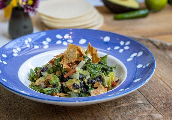 CHOPPED TACO SALAD lettuce, avocado, pickled peppers, black beans, crunchy tortillas