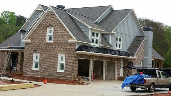 New architectural shingle roof with standing seam details in Milton, GA. www.roofwithauthority.com