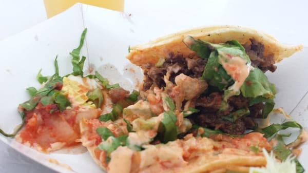 Korean bbq taco with kimchi and secret sauce at Chilantro.