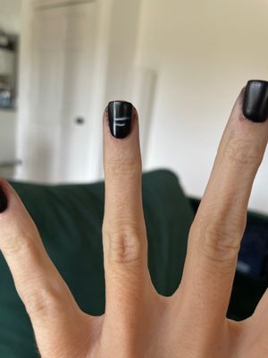 The lines she drew are not straight. Also around my nail bed is stained black. I can't get the black off.